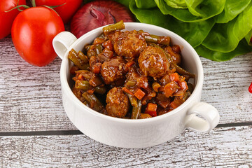 Meatball with vegetables and spices
