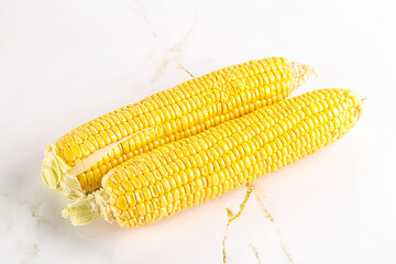 Sweet yellow raw corn cob