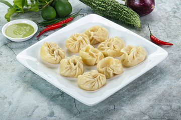 Nepali steamed dumplings  Momo with sause