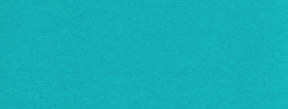 Texture of craft blue and turquoise paper background colors, macro. Structure of vintage cerulean cardboard.