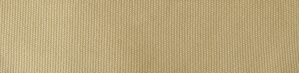 Background of knitting patterns front and back stitch.Top view, close-up. Handmade knitting wool or...