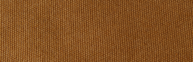 Background of knitting patterns front and back stitch.Top view, close-up. Handmade knitting wool or cotton fabric texture. 