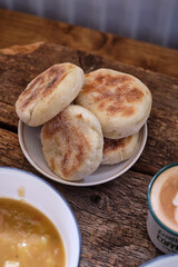 Syrnik  on a wooden background.
cheese pancake. 