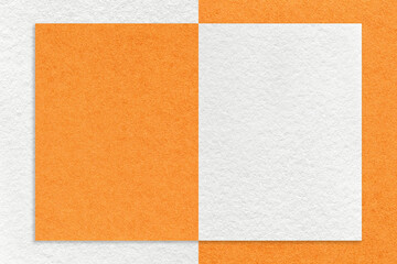 Texture of white and orange paper background with geometric shape and pattern, macro. Craft...