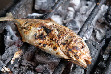 grouper grilled on a charcoal grill. grilled sea fish. Indonesian food. ikan kerapu bakar.
