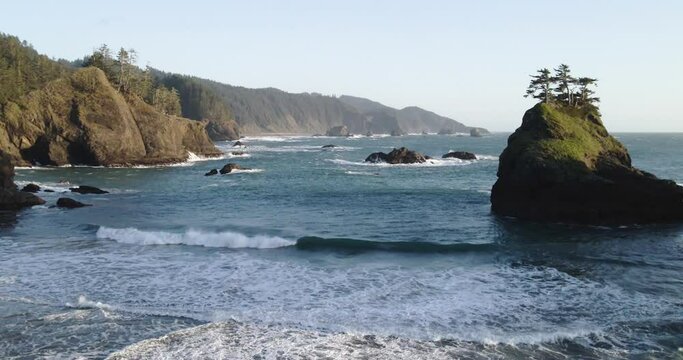 4K Drone Aerial footage of rock cliffs at Secret Beach Samuel Boardman Brookings Oregon