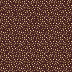 Seamless background with random elements. Abstract brown and golden ornament. Seamles abstract pattern