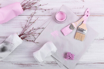 Sustainable hobby background with handmade vase or houseplant pots. Creative upcycling DIY idea, craft upcycled tin can pots for home decoration. Top view, flat lay