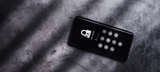 Top view of smartphone with two factor authentication to protect information on screen. Cybersecurity and privacy protect data. Pin code. Cyber hacker threat. © Elena Uve