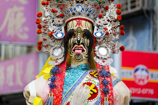 Mask and ornamental dress in Taipei