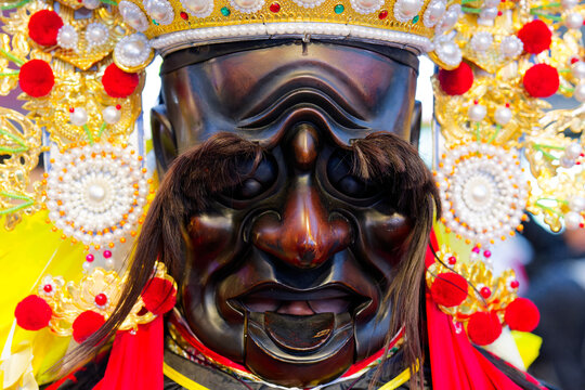 Wooden god mask religious costume