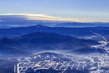 Winter nature panorama with Sheregesh ski resort in Altai, Russia, picturesque view, aerial tonal...