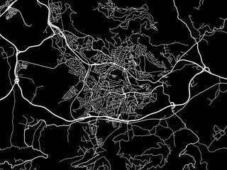 Vector road map of the city of Tizi Ouzou in Algeria with white roads on a black background.