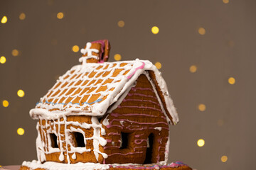 Christmas house made of gingerbread cookies decorated with sugar icing