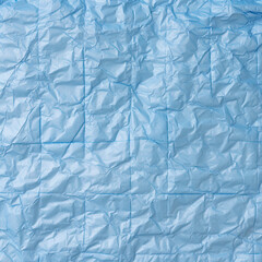 Obraz premium Blue Sheet of Paper with Wrinkles