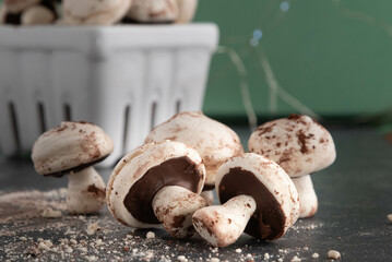 Making delicate, meringue mushroom cookies.