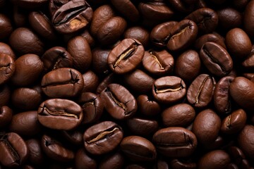 Obraz premium Aromatic bliss. Close up of roasted coffee beans in warm tones. Morning delight. Dark roast. Gourmet drink experience