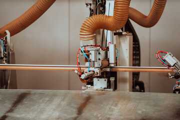 A state-of-the-art CNC machine in a modern wood processing facility showcases the seamless fusion...