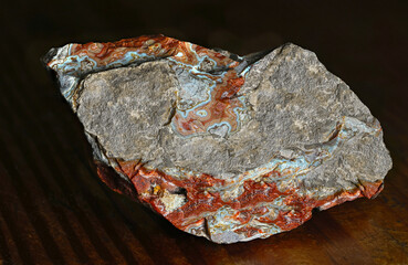 A lace agate quartz specimen isolated on a black background