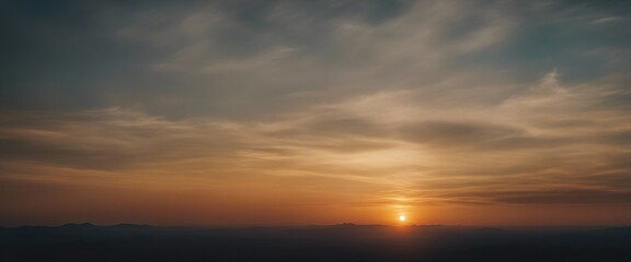 Naklejka premium view of sunset and cloudy sky viewed from mountain top
