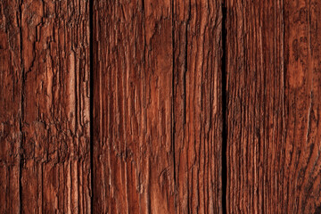 Brown textured wood surface as natural background for your design. Top view with copy space.