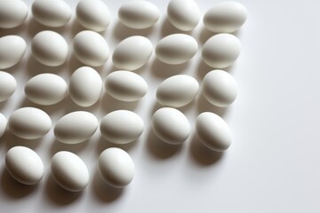 Tablets that lie on a white sheet of paper