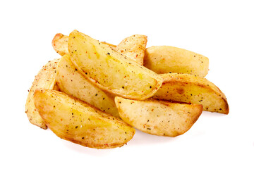 Fresh baked potato wedges with seasonings, on a white background