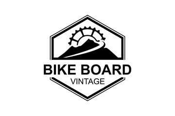 Rocky mountain logo with downhill bike gear elements.