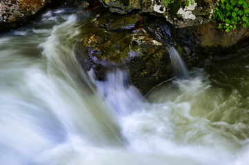 water flowing over rocks