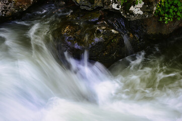 water flowing over rocks