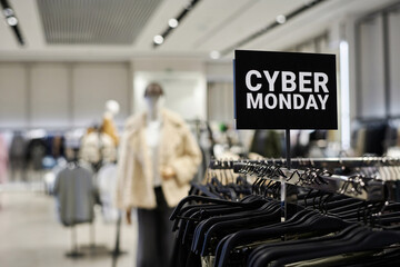 Closeup shot of cyber monday advertising banner at clothing store, copy space