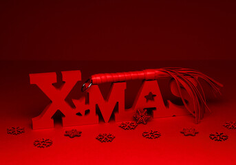New Year 2024 red background with BDSM stack. Sexual game