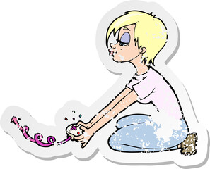 retro distressed sticker of a cartoon girl playing computer games