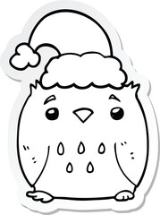 sticker of a cute cartoon owl wearing christmas hat