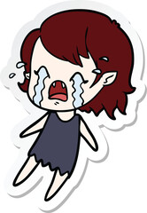 sticker of a cartoon crying vampire girl