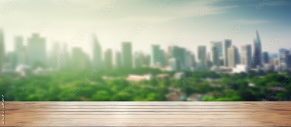 Poster morning city background with blurred window glass garden green and wood table top for product displa