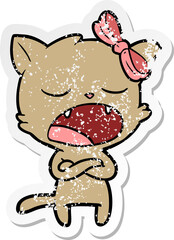 distressed sticker of a annoyed cartoon cat