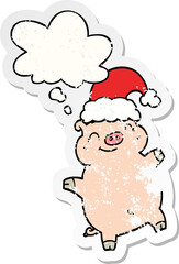 cartoon happy christmas pig with thought bubble as a distressed worn sticker