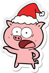 hand drawn sticker cartoon of a pig shouting wearing santa hat
