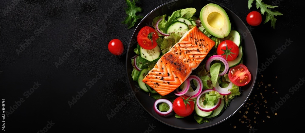 Poster Grilled salmon and vegetable salad with tomato onion olives and avocado Copy space image Place for adding text or design