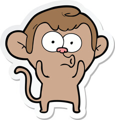 sticker of a cartoon hooting monkey