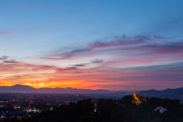 Chiang Mai valley and Doi Saket temple at sunset. Amazing northern Thailand landscape at sunset.
