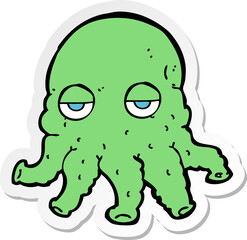 sticker of a cartoon alien squid face