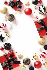 Christmas vertical banner, poster design. Frame of red gift boxes with black ribbon bows, shiny balls, chic decorations, confetti on white background. Flat lay, top view.