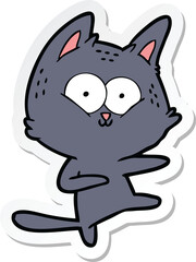 sticker of a cartoon cat dancing