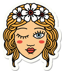 sticker of tattoo in traditional style of a maidens face winking