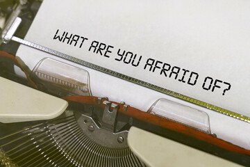 The text is printed on a typewriter - What Are You Afraid Of - obrazy, fototapety, plakaty