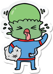 sticker of a weird cartoon alien