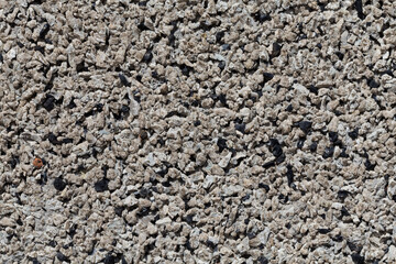 Crushed granite stones wall - close up