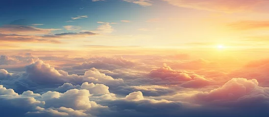 Zelfklevend Fotobehang Aircraft viewpoint above clouds displaying breathtaking sunset Copy space image Place for adding text or design © vxnaghiyev